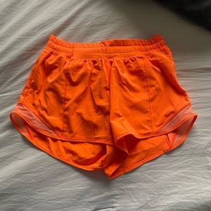 Size 6 tall, orange Lululemon shorts